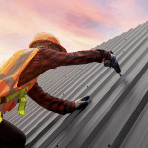 single man painting the roof of a house